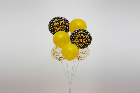 Set of balloons with 'Happy Birthday' text on a white background