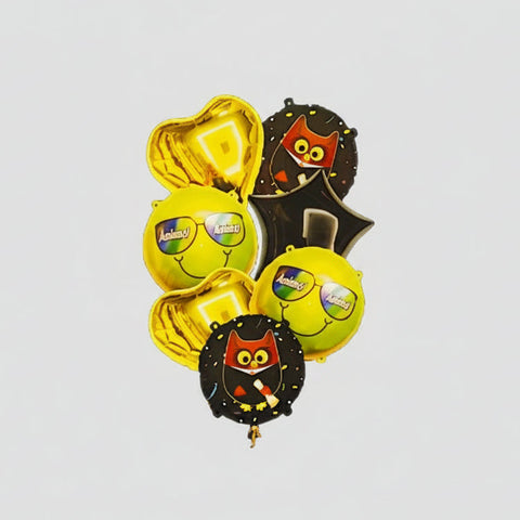 Halloween-themed balloon bouquet with owl designs on a white background