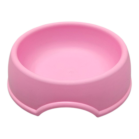 Pink pet bowl on a white background