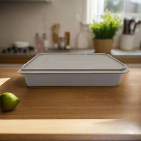 Rectangular beige container with lid on a white background