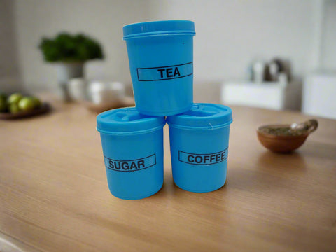 Three blue containers labeled 'Tea', 'Sugar', and 'Coffee' on a white background.