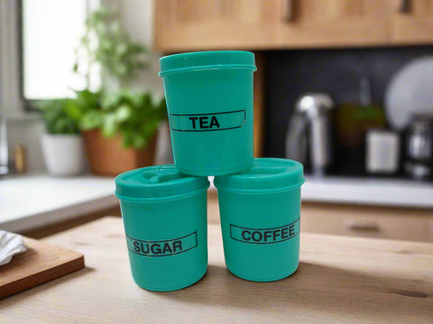 Three teal containers labeled 'Tea', 'Sugar', and 'Coffee' on a white background.