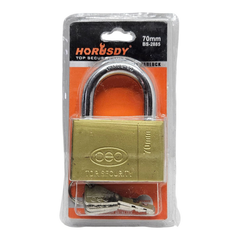 Brass padlock with keys in packaging on a white background