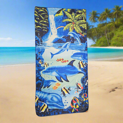 Towel with dolphins and tropical scenery design on a white background