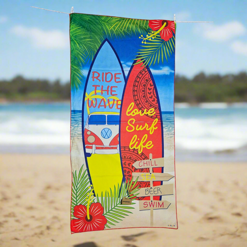 Towel with surfboard design, beach elements, and text on a white background