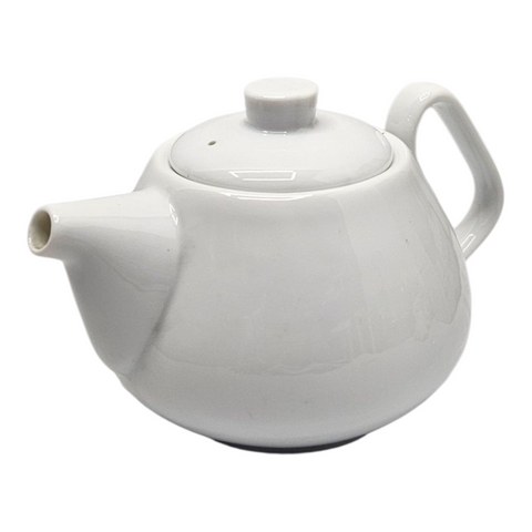 White ceramic teapot on a white background