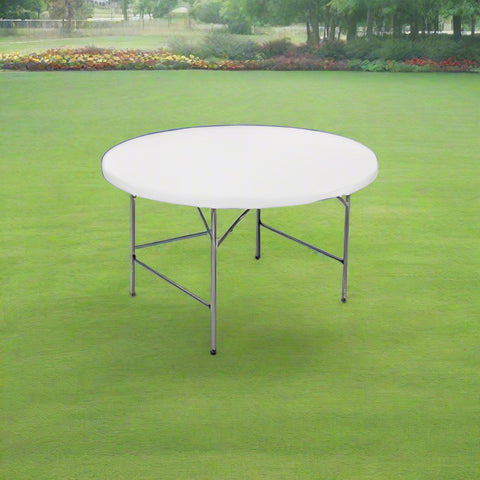 Round white table with metal legs on a white background