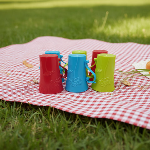 Set of colorful plastic cups on a white background