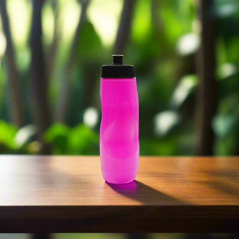 Pink water bottle with black cap on a white background